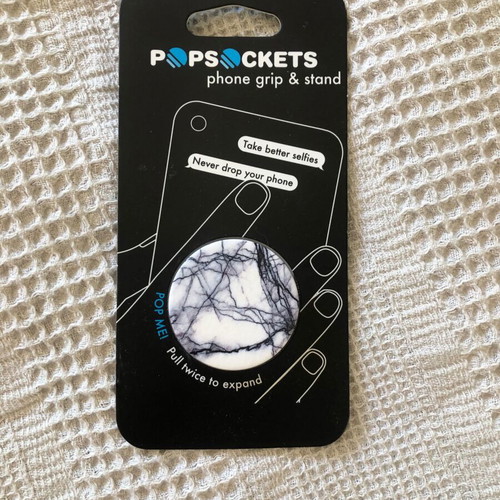 Phone grip and stand unused, adhesive, for all phones