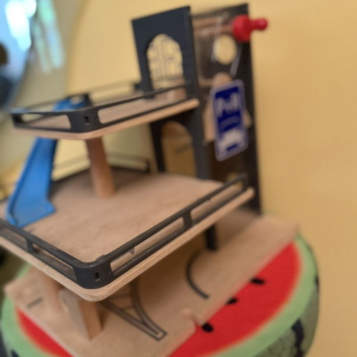 Wooden toy garage with ramp used, two levels