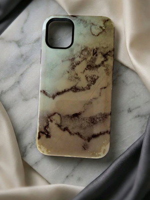 iPhone 11 case used with marble effect in grey and black