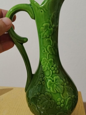 Ceramic jug with vine decoration