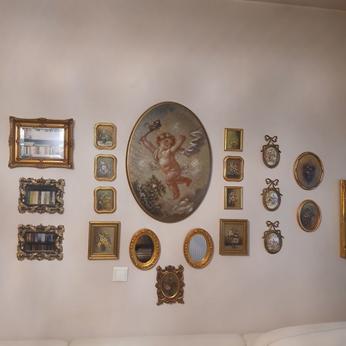 Various small framed paintings and mirrors