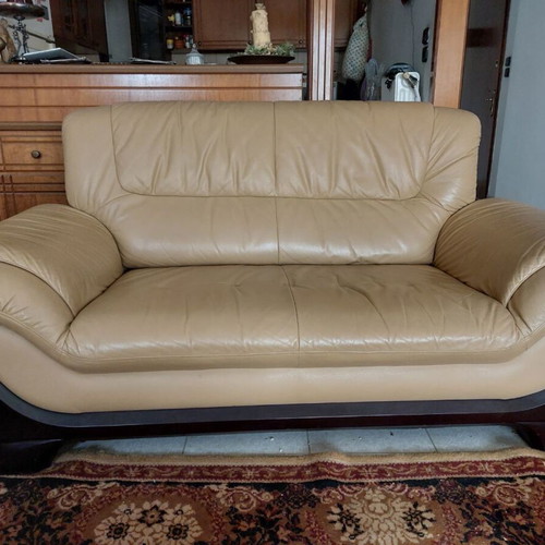 Living room furniture set with leather sofas, coffee table and TV unit