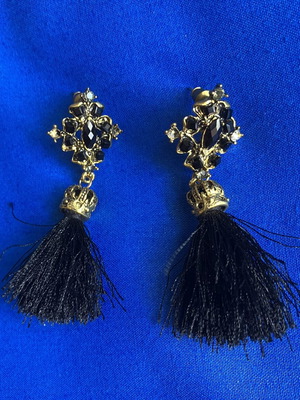 Gold and black earrings with tassel