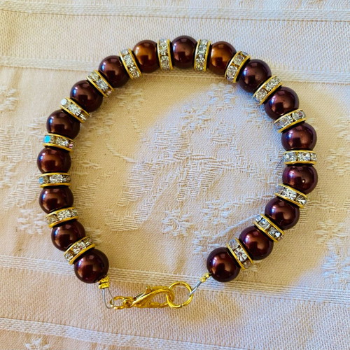 Brown glass pearl bracelet with gold rhinestone spacers new