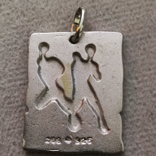 Silver pendant new 2.5 cm by 0.2 cm
