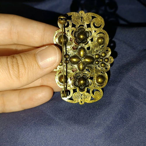 Vintage brooch used with filigree design and gold finish