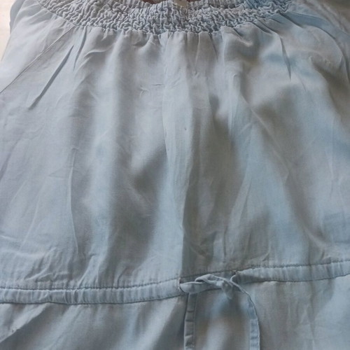 Turquoise women's blouse with elastic top used, size Medium