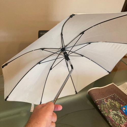 Peg Perego stroller umbrella used, cream color