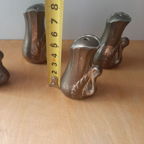 Vintage salt and pepper set with swan designs, used, 4 pieces