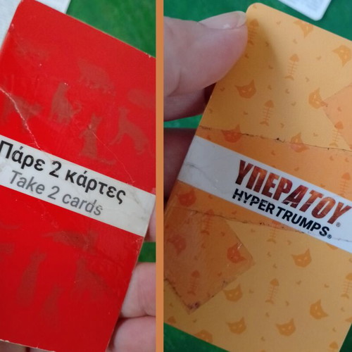 Yperatou card games used, cats and dinosaurs