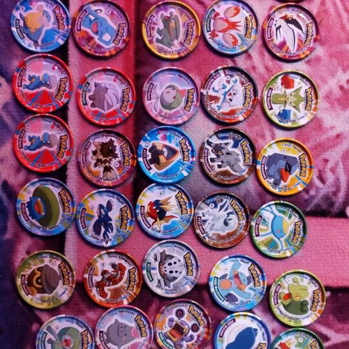 Pokémon advanced metal tazos set 42 metal tazos + 1 Megaman metal tazos like new