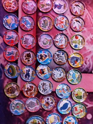 Pokémon advanced metal tazos set 42 metal tazos + 1 Megaman metal tazos like new