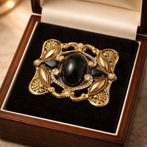 Vintage Atelier brooch used with black stone and gold decoration