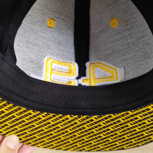 Liebherr Snapback Hat used, black and yellow