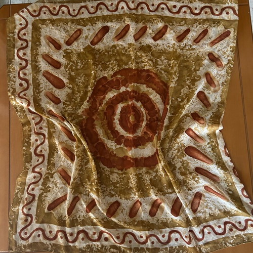 Scarf with patterns like new, beige and brown