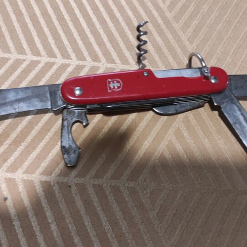 Colonial Swiss Master red multitool knife used