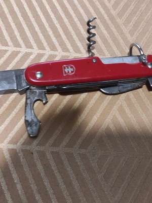 Colonial Swiss Master red multitool knife used