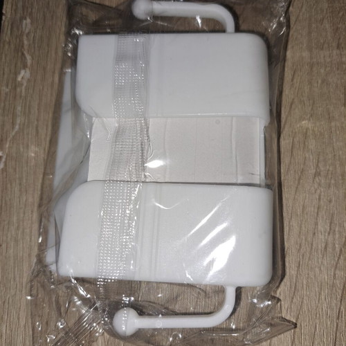 White wall-mounted plastic holder organizer for mobile phone or remote