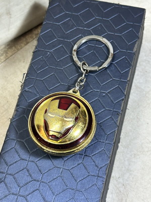 Marvel Iron Man keychain used, embossed Avengers mask
