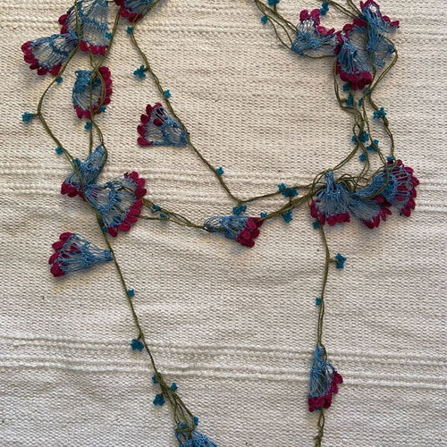 Knitted necklace like new, handmade with crochet, blue and purple