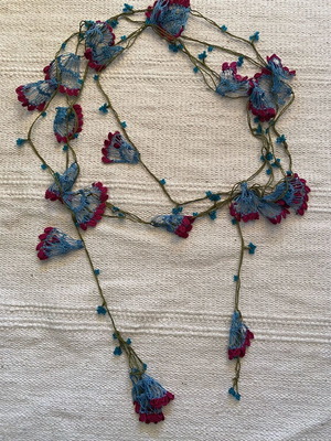 Knitted necklace like new, handmade with crochet, blue and purple