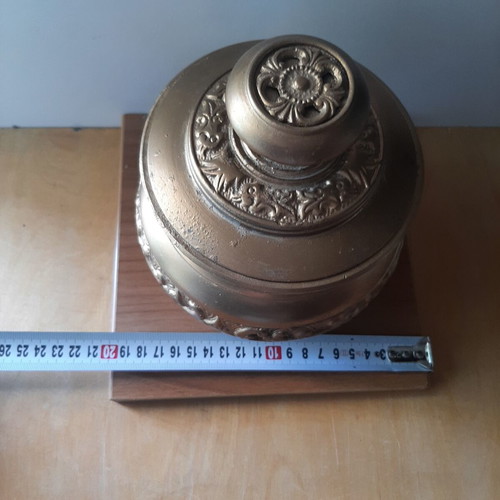 Vintage metal vessel with wooden base used, decorative aroma container