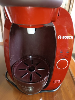 Tassimo coffee machine like new with capsules