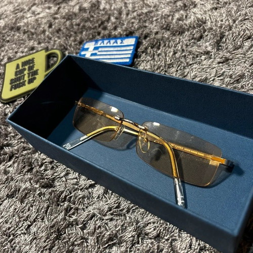 Top sunglasses with orange lenses