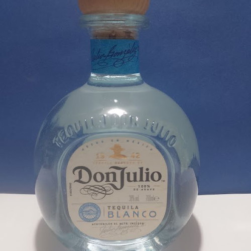 Don Julio tequila bottle like new with tsipouro and 2 shot glasses