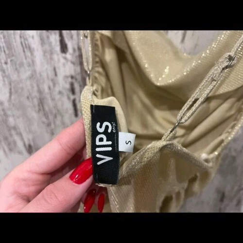 Top with side zipper gold new, size S
