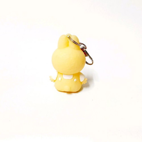 Labubu "Have a Seat" Keychain collectible figure yellow