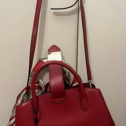 DKNY red leather handbag new with tags and protective case