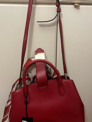 DKNY red leather handbag new with tags and protective case