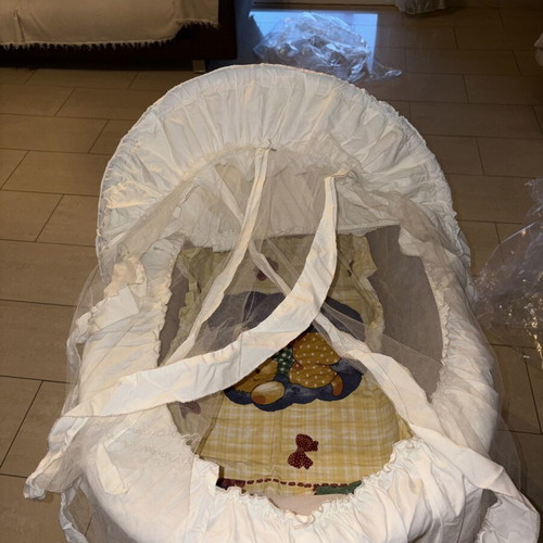 Baby Bassinet with Metal Base and Wheels like new