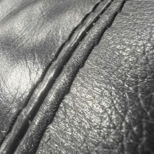 Black leather two-seater sofa with electric relaxing mechanism new