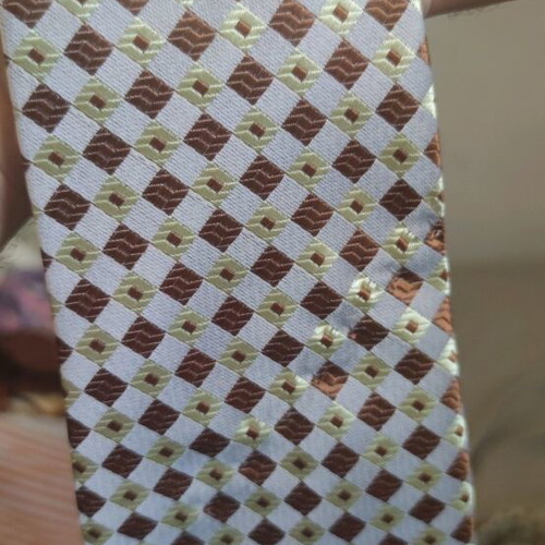 Silk tie new with diamond pattern in gray, brown, and green