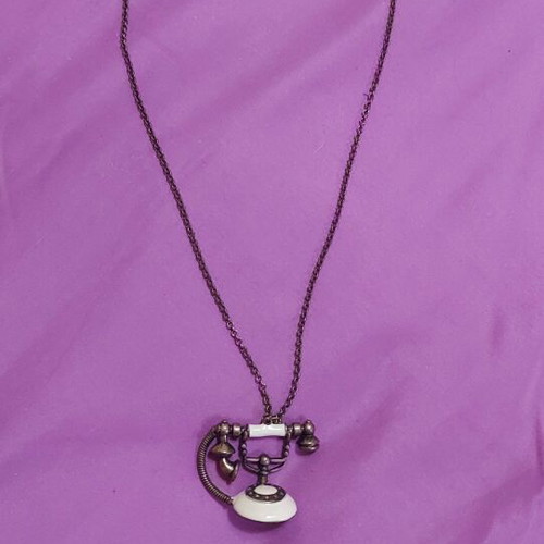 Necklace with phone pendant used