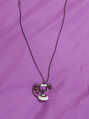 Necklace with phone pendant used