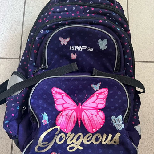 School backpack for girls used, large with many pockets