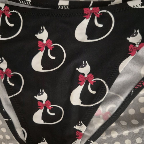 Swimsuit set new with cat print, size M, pink and black