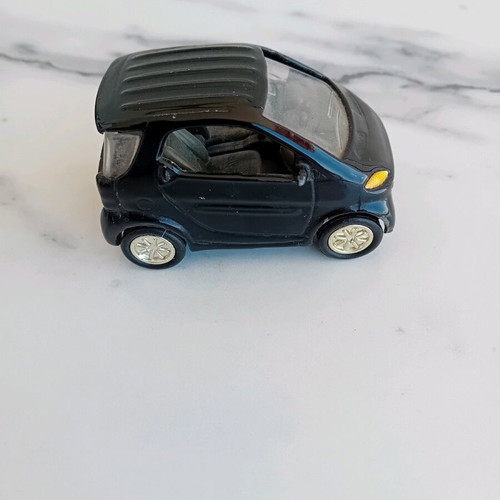 Smart toy car used, metal and plastic, with spark needs repair