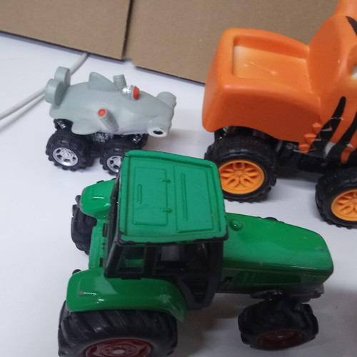 Children's toy set with submarine, cars, tractor, and magic lamp
