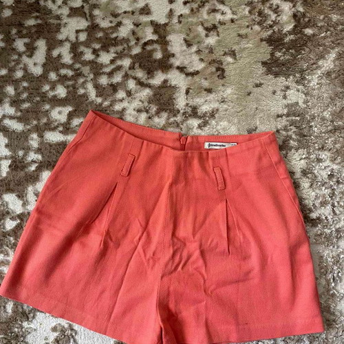 Coral shorts used, size 34