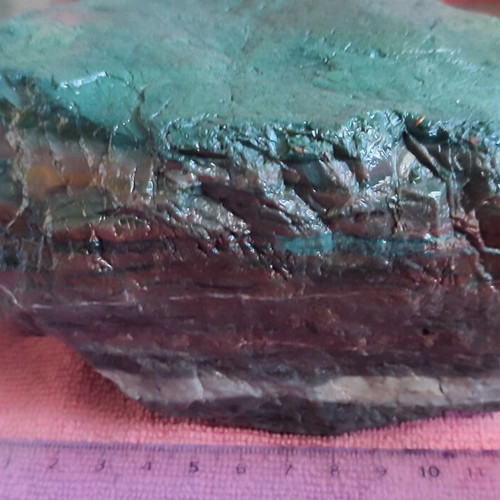 Rock with green, turquoise, brown, blue and white shades, new