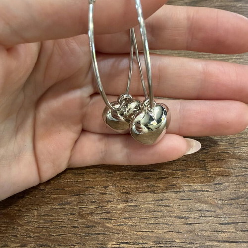 Hoop earrings with hearts silver like new