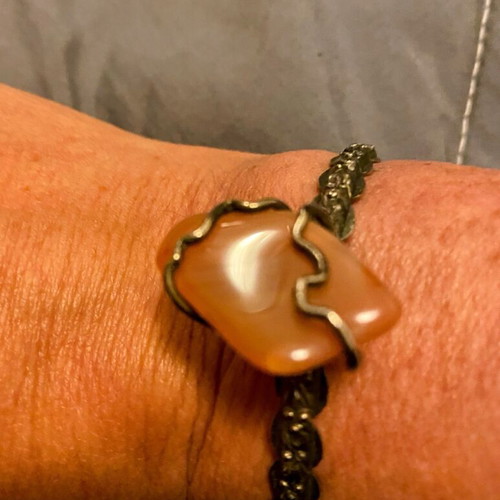 Handmade bracelet used with large amber stone