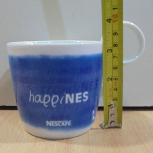 Nescafe Happines promotional porcelain mug used