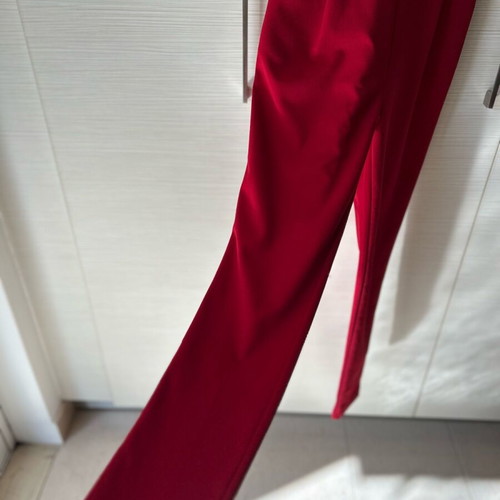 Red one-piece jumpsuit like new with side cutouts and bust support