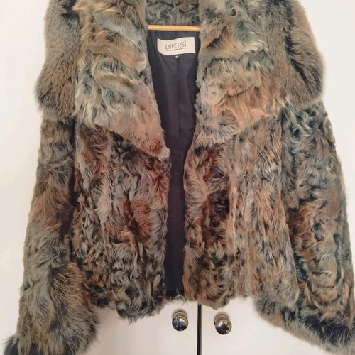 Diversi natural fur size 38 like new
