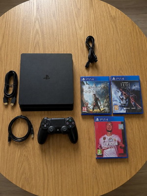 PlayStation 4 Slim 1TB console like new with 3 games